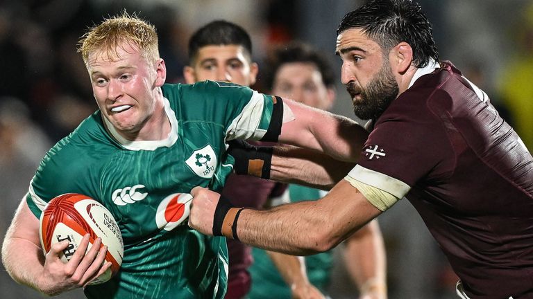 Jamie Osborne of Ireland is tackled by Beka Saghinadze of Georgia