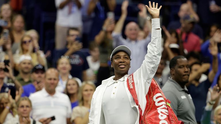 Venus Williams, of the United States, waves to fans after being defeated by Karolina Muchova, of the Czech Republic, during the first round 
